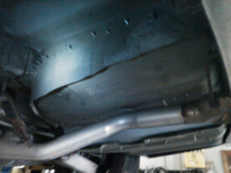 Illustration for article titled When you really, truly have to have a center exhaust on your E39